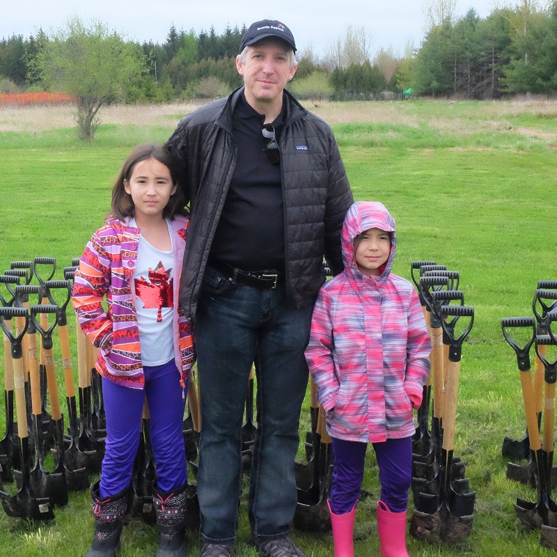 Co-chair Todd Ernst with family at Partners in Project Green spring planting event